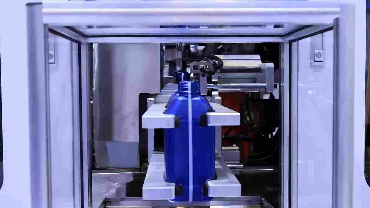 all electric blow molding machine robotic arm bottle takeout station