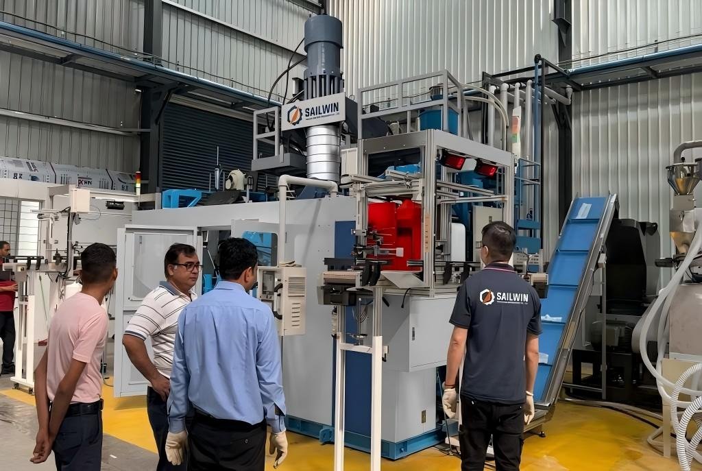 Sailwin engineers on-site installation and commissioning of large blow molding machine at overseas customer factory