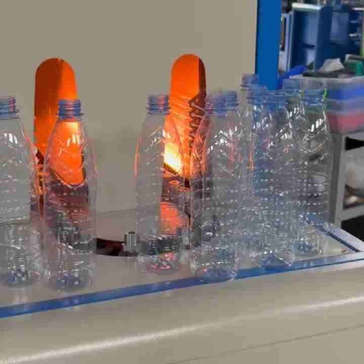 SW-2000-2 semi automatic PET blow molding machine preform infrared heating production demo