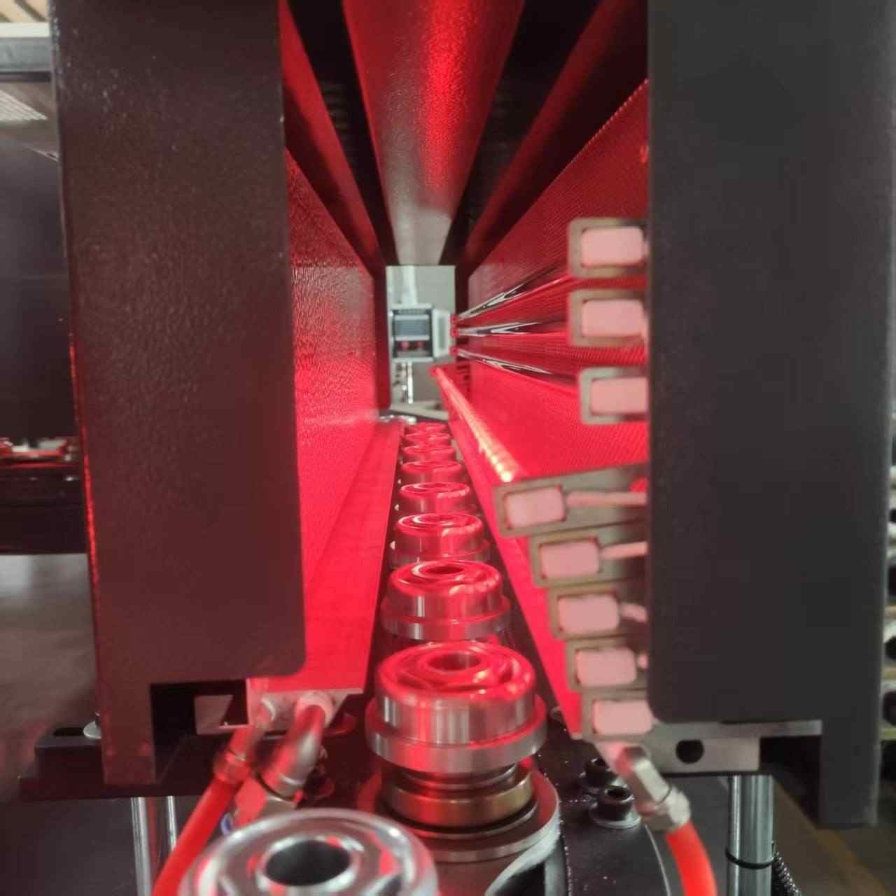 Infrared heating tunnel oven equipped with vertically adjustable high penetration lamps for uniform PET preform temperature control — Sailwin