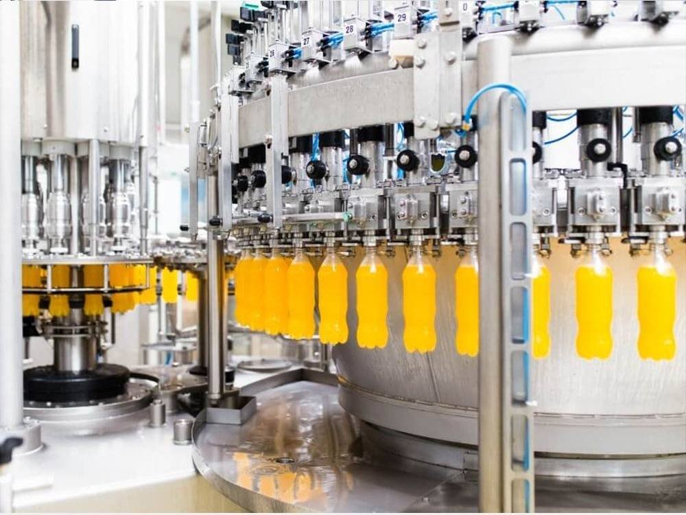 Hot fill juice and tea beverage filling machine rotary monobloc